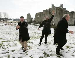Joe Reilly, Gerry Adams and Martin McGuinness enjoy the snow on the campaign trail in Trim