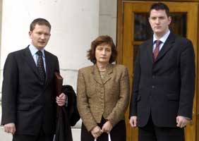 The family of murdered solicitor Pat Finucane wife Geraldine with sons Michael and John