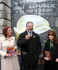 Gerry Adams launches Easter Lily campaign at St Stephen's Green, Dublin with Sorcha Nic Cormiac and Caoilfhionn Ni Dhonnabhain.