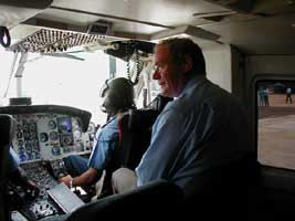 Martin McGuinness travelling by military helicopter from Colombo to the Tamil area