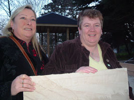 Sinead Moore and Sue Ramsey MLA with an engraved sandstone paving stone donated for the new Women's Memorial Garden being built in Belfast by Macalla na mBan in memory of women who dedicated their lives to the struggle for Irish freedom