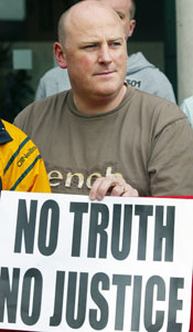 Mark Sykes who was injured in the Sean Graham bookmakers shooting on the Ormeau Road in February 1992, pictured at the anti collusion protest outside court in Belfast, Monday 2 July 2007