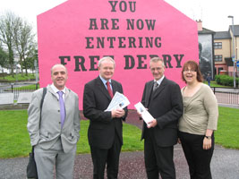 David McCartney, Seán Martin and Ruth Noonan of the Rainbow Project with Deputy First Minister, Sinn Féin’s Martin McGuinness at Free Derry Corner, which has been painted pink for the occasion, as part of events to launch the Foyle Pride Fes