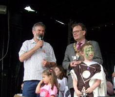 Gerry Adams and Tom Hartley with young Celts at the opening day of Féile