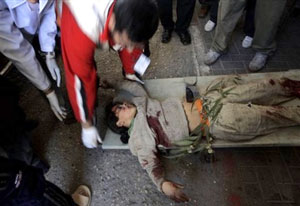 Palestinians carry the body of a girl who was killed by Israeli forces in Gaza