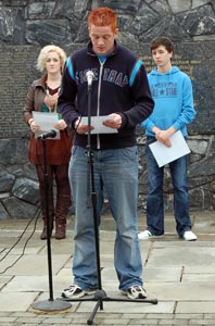 YOUNG REPUBLICANS: Liam Duggan, Maria O’Kane and Sean Bateson reading the Roll of Honour in the Garden of Rememberence