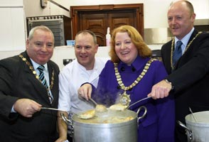 Danny Lavery, Naomi Long, Frank McCoubrey and chef Stephen Jeffers at Belfast City Hall