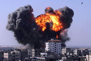 Explosions after an Israeli air strike in Gaza Strip in January 2009