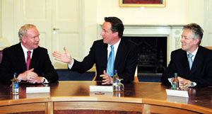 Martin McGuinness with Cameron and Peter Robinson in Stormont