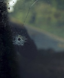Bullet Hole in Wndow -Aftermath Exhibition