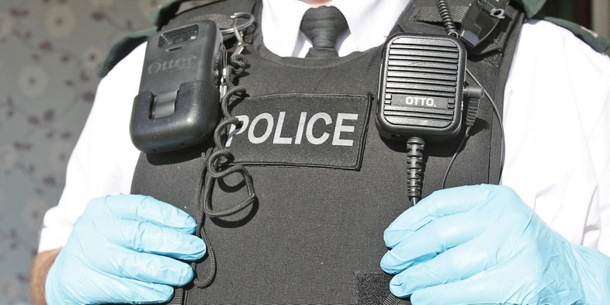PSNI in search gloves