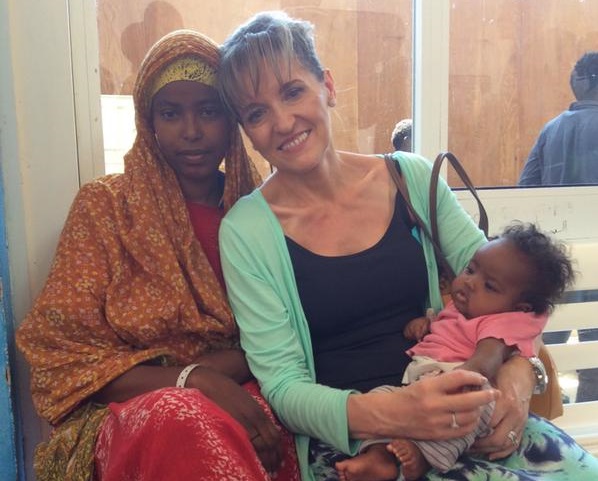 Martina Anderson with refugees