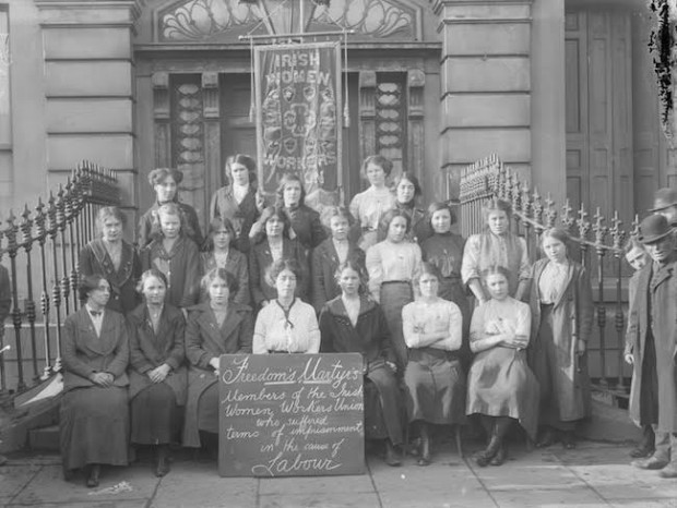 Members of the Irish Women Workers’ Union, 1914. Helena Molony is seated third from left, front row, beside Delia Larkin (with board)