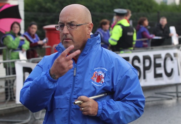 Unionist bandsman gives V sign