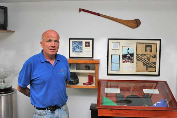 Seán with 1981 hunger striker Kevin Lynch’s beret, gloves and flag, his hurl and All-Ireland medal in the Dungiven Museum