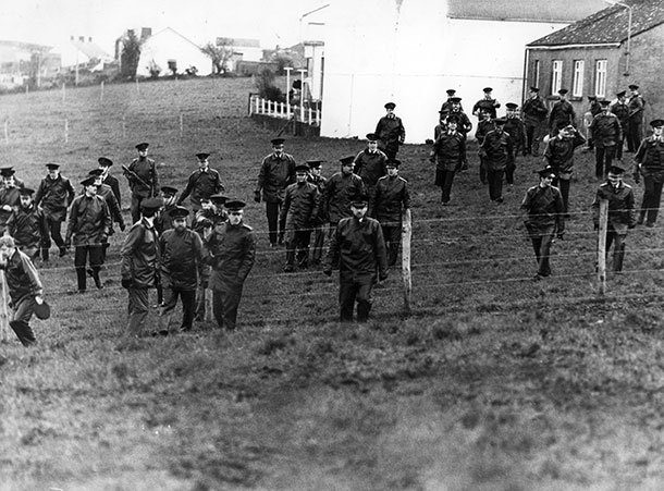 Heavy RUC presence at the funeral of Volunteer Antoine Mac Giolla Bhríghde