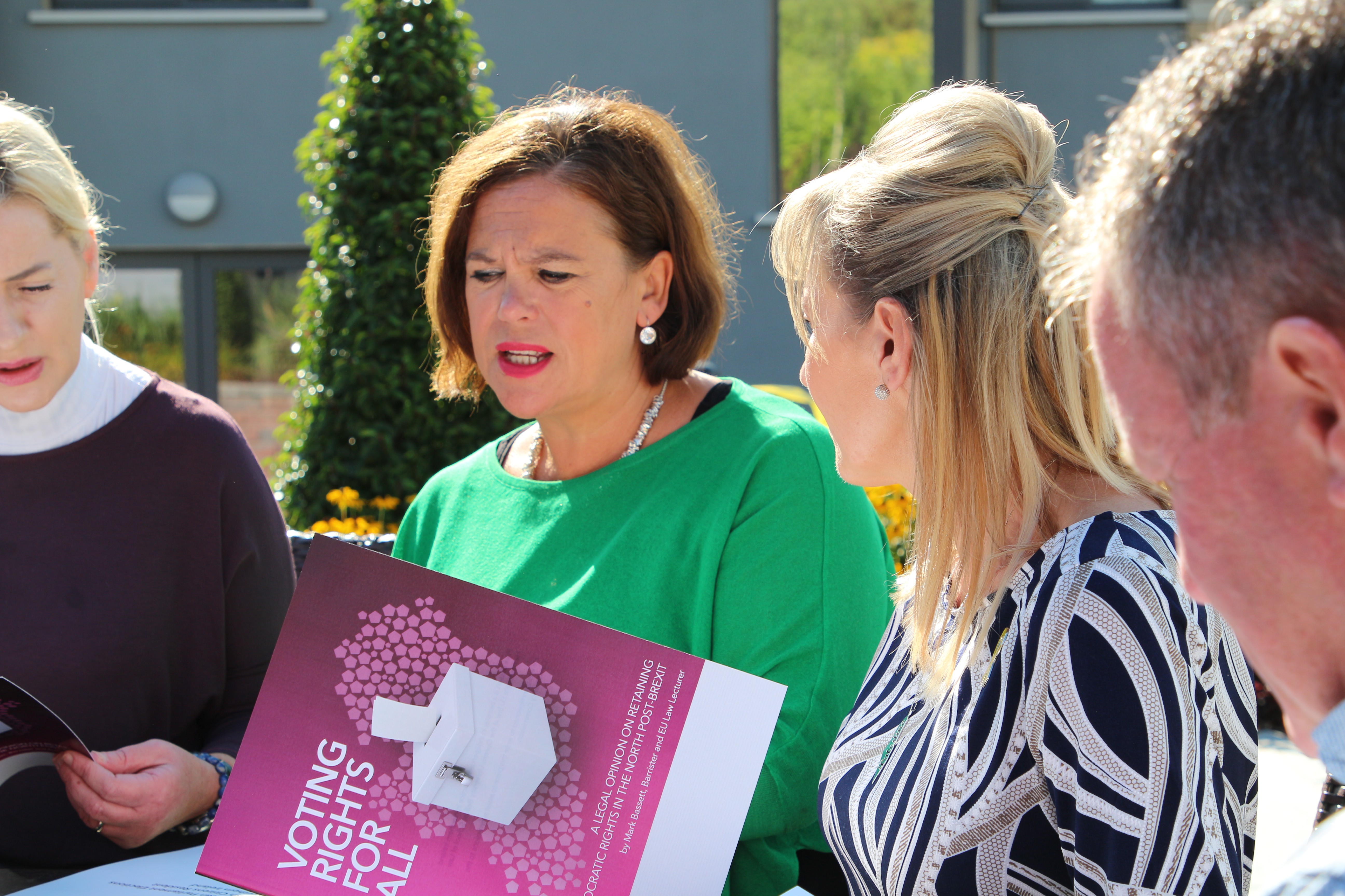 Mary Lou McDonald discussing the legal report with Martina Anderson.