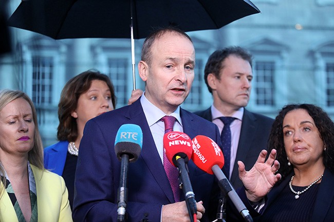 Is Micheál Martin telling us if his party stands candidates in the North, and they are successful, they will take the Oath to the English Queen?