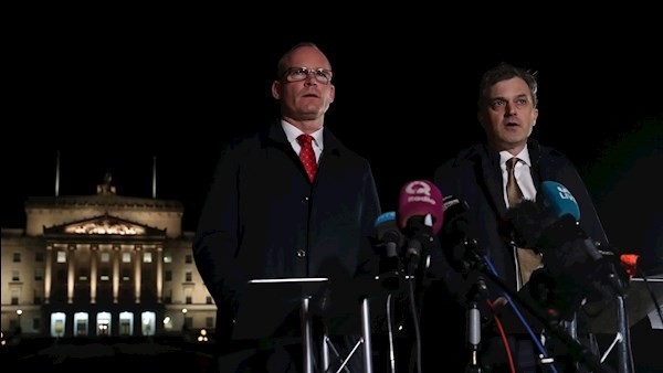 Simon Coveney and Julian Smith.