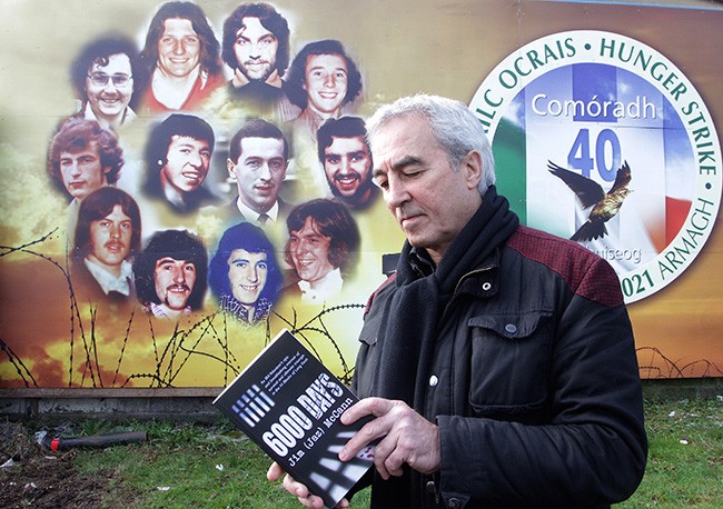 Former Hunger Striker and Blanketman Pat Sheehan with a copy of 6,000 days