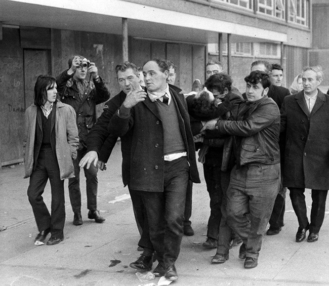 Paddy Doherty, one of the thirteen shot dead on Bloody Sunday, Derry, Jan 30, 1972, being carried away from Rossville Flats.