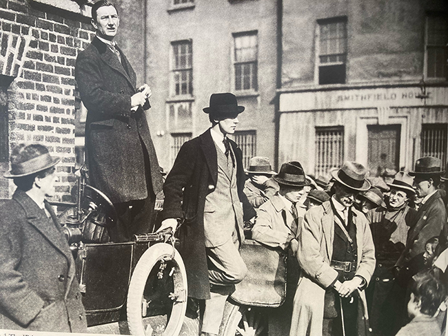IRA Dublin Brigade mass mobilisation at Smithfield on 2 April 1922 hears the outcome of the Convention from Dublin Brigade OC Oscar Traynor (speaking from car) with Rory O’Connor (left)