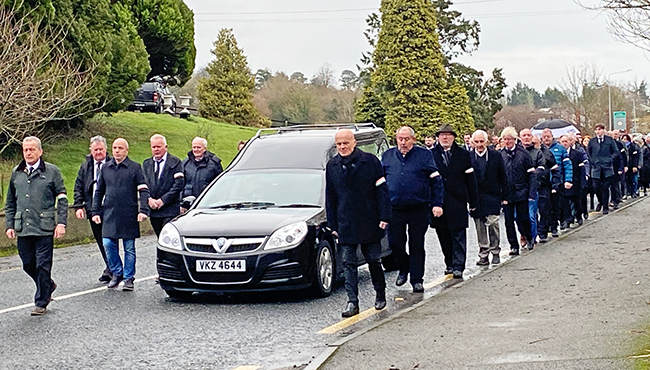 Hensey’s tricolour draped coffin was flanked by a guard of honour, comprised of republican comrades from counties Monaghan and Derry.