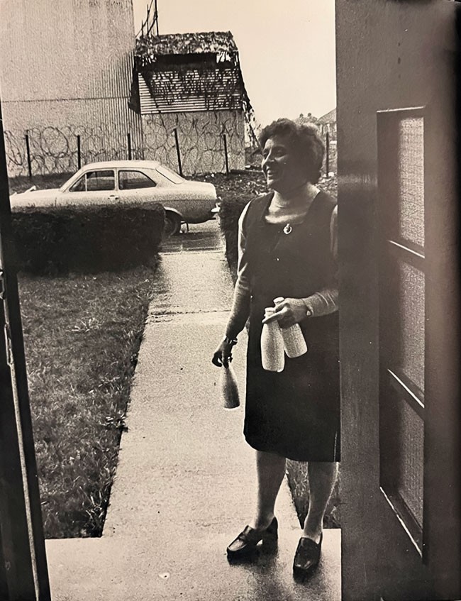 Máire Drumm at her Andersonstown home with a British Army observation post opposite her door