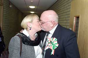 Martin Meehan kisses his wife