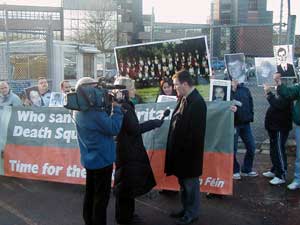 Sinn Féin MLA Conor Murphy talks to the media at an An Fhírinne picket at Stormont on Thursday 4 December highlighting collusion