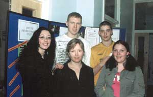 Tar Anall Youth Development Unit project coordinator Jeannette Keenan (front and centre) is pictured with some of the young people in the project who received certificates of achievement