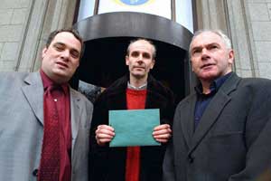 Cormac Breatnach (centre) with TDs Aengus O Snodaigh and Tony Gregory