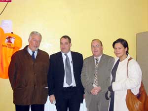 Aengus Ó Snodaígh and Marylou McDonald talk with Dublin City Council officials Gerard Geoghegan and Declan Ronan before the start of a Sinn Féin public meeting on housing in Crumlin on Monday evening