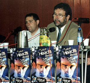 Philip McTaggart (right) addresses a conference on suicide