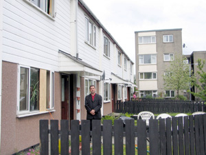 Sinn Féin MLA Willie Clarke outside a Ballynahinch home attacked by loyalist youths