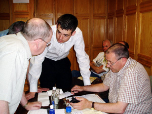 Pearse Doherty, who almost took an MEP seat but did take a seat on Donegal County Council, discusses the figures with Derry's Dominic Doherty and Mitchel McLaughlin