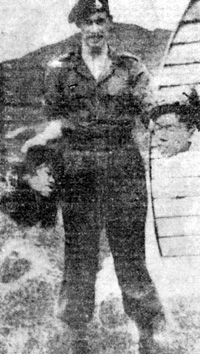 Nothing new under the sun — A British soldier pictured in 1964 displays heads severed from Malayan guerrillas