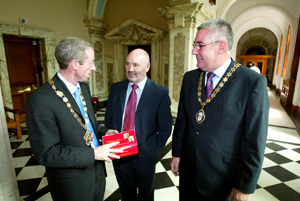 Joe O'Donnell (right) pictured at Belfast City Hall with party colleagues Gerry McHugh, chair of Fermanagh District Council and former Belfast Mayor Alex Maskey