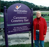 Briege Meehan at Carnmoney cemetery, where Catholic graves have been desecrated and sectarian demonstrations have been held during the annual Blessing of the Graves