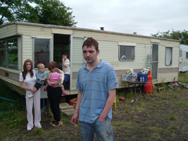 Christopher Magill and his sister Lisa are pictured after being driven from their home