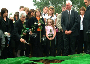 The Cahill family say their final farewell at the graveside