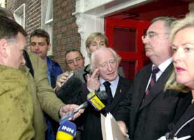 Michael D Higgins and Pat Rabbitte. Michael's gesture says it all!