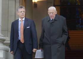 Peter Robinson and Ian Paisley are pictured leaving Government Buildings in Dublin