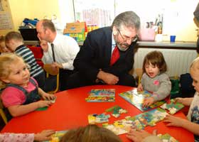 Gerry Adams discusses the issues of the day with young patrons of the community creche in Ringsend, Dublin