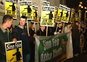 Sinn Féin members picket City Hall on Monday evening