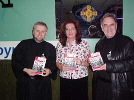 Anne Cadwallader, author of Holy Cross, the untold story, with Holy Cross priests Fathers Gary and Aidan