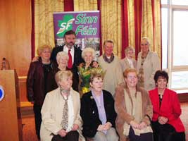 Gerry Adams with Bridget Hannon and other republican women at the exhibition launch