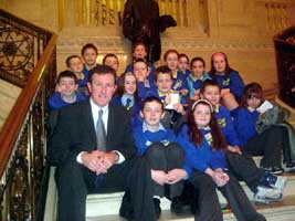 Conor Murphy with a group of Newry schoolchildren visiting Stormont