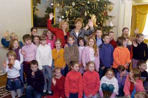 Children from the Chernobyl Children's project, along with Adi Roche, are pictured with Mary McAleese on their visit to Áras an Uachtarán in December