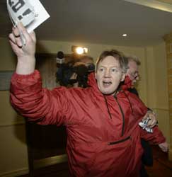 Flair Campbell of the Anti-Rcaist Network is ejected from an SDLP meeting in Belfast after protesting the racist policies of PD Justice Minister Michael McDowell